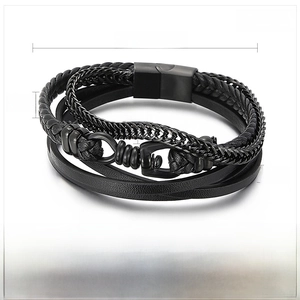 Detailed view of men's multi-layer woven leather bracelet with stainless steel accents