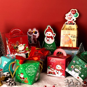 Detail of assorted 3D Christmas gift boxes in square and pyramid shapes with festive patterns