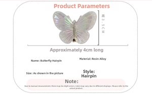 Detailed view of iridescent butterfly clip made of resin with size 4cm x 3.5cm