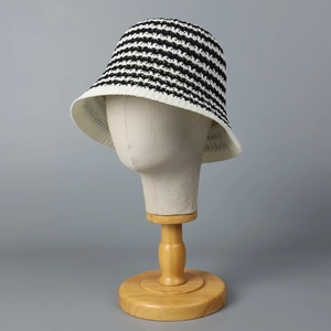 Japanese style striped knit bucket hat in black and white with hollow mesh texture