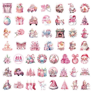 Flat lay of 48 pink Christmas stickers with Santa, gingerbread, and holiday motifs