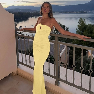 Detail of yellow U-neck bodycon dress featuring elegant waist ruching and cutout chest design