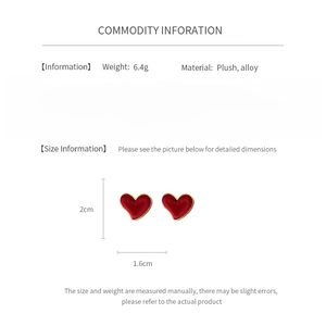 Detail showing dimensions of red velvet heart earrings with silver needle information