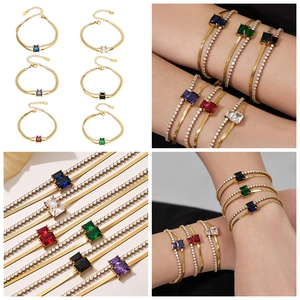 Detail of double-layer bracelet featuring emerald-cut stone and gold-tone claw-set zircon