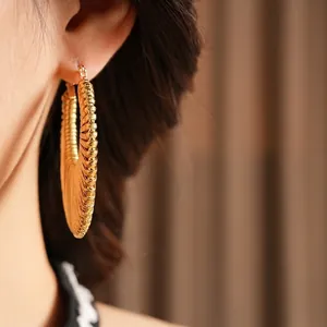 Chic golden textured hoop earrings with a precision horizontal ribbed design for women