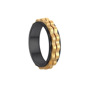 Detail eines zweifarbigen 6mm Drehrings mit goldener Wellenstruktur und schwarzem Stahl