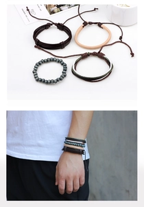 Detail of four-piece layered set including woven leather, cord, and matte beaded bracelets