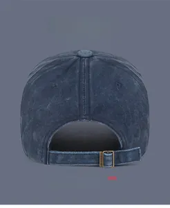 Detail of vintage washed baseball cap back view featuring adjustable metal strap buckle