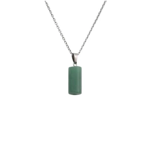 Minimalist silver chain with cylindrical green stone pendant on white background