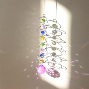 3D spinning wind chime showing colorful crystals reflecting rainbow prism light effects