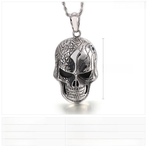 Detail view of punk skull pendant with technical specs for weight and dimensions