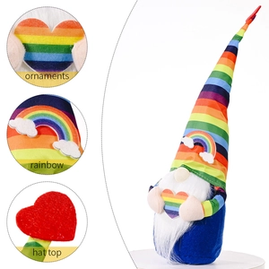 Rainbow stripe gnome doll with tall hat and white beard on a clean white background