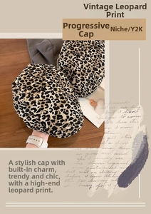 Detail of American vintage leopard print duckbill caps showing fabric texture and Y2K style