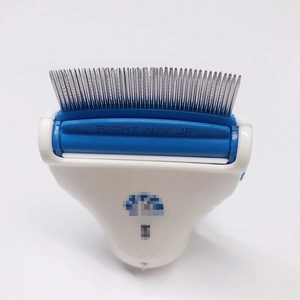 Detail view of the fine stainless steel teeth and blue toggle on the pet flea comb