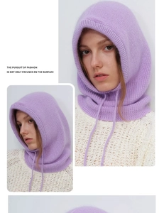 Detail of light purple knitted balaclava with drawstring and thick wool texture