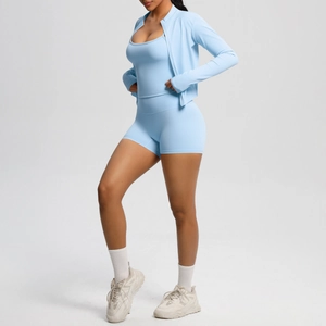 Three-piece light blue yoga set with zipper jacket, sports bra, and high-waist shorts