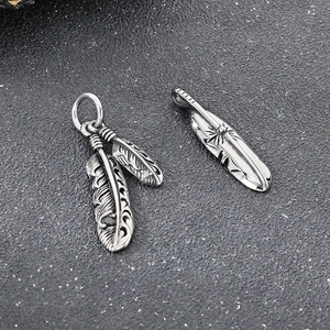 Vintage punk feather pendant necklace in silver stainless steel with intricate textures