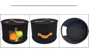 Felt hat storage box detail featuring leather handles and internal elastic security straps