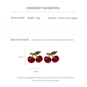 Detailed technical chart showing size and materials of red resin cherry earrings