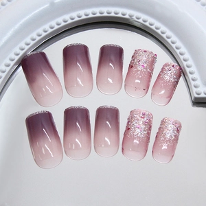 French lavender gradient press-on nails with fine glitter edges and shimmering pink sequins