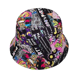 Reversible 90s graffiti bucket hat with vintage radio and pop art patterns