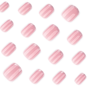 Short square French press-on nails with nude pink base and silver glitter tips