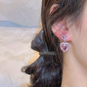 Pink heart-shaped zircon earrings with silver trim and small crystal accents on ear studs
