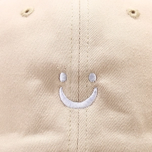 Classic khaki embroidered smiley face baseball cap in premium twill cotton for men and women
