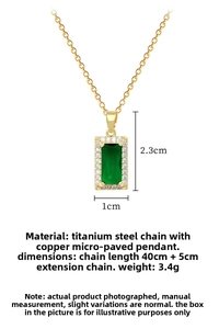 Detail view of green square emerald pendant with crystal pavé and 1x2.3cm size markers