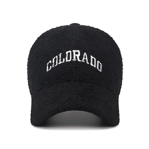 Plush black Sherpa baseball cap with white Colorado embroidery for winter warmth