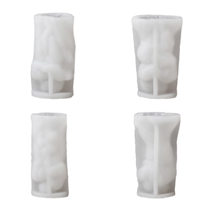 Macro view of white silicone molds for DIY candles with artistic pleated textures