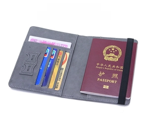 Slim grey RFID passport holder showing internal slots for 4 cards and 2 SIM cards