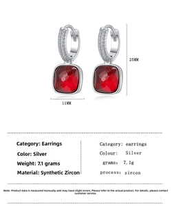Detail view showing 25mm height and 11mm width dimensions of red zircon earrings