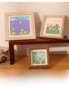 Three-tiered square wooden picture frames in natural wood tones for DIY art displays