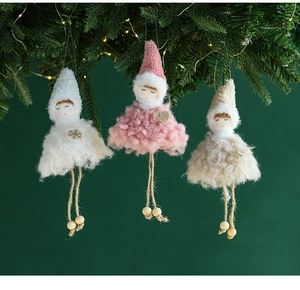 Plush angel ornaments set with knit hats and wooden bead legs on Christmas tree