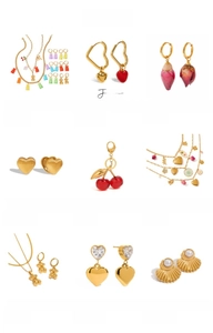 Collage of stainless steel bear earrings and cherry pendants with shell pearl details