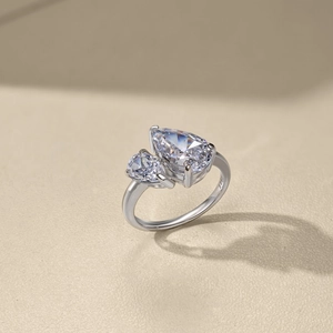 Macro detail of S925 sterling silver ring featuring double pear-cut shimmering zirconias
