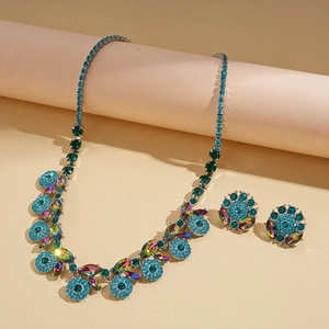 Vintage crystal flower necklace and earrings set with emerald and sapphire stones