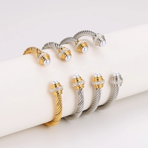 Twisted cable cuff bracelet with pearls and pavé cubic zirconia in gold and silver