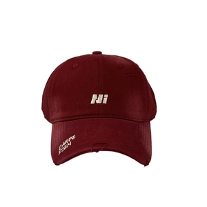 Distressed dark red baseball cap with white NI embroidery and curved brim for sun protection