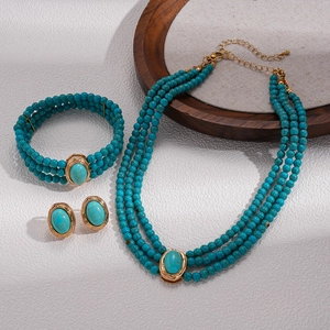 Bohemian multi-layer turquoise beaded jewelry set with gold necklace and bracelet