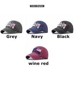 Detail of USA SPORTS embroidery and American flag on washed cotton baseball caps in four colors