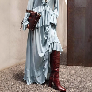 Bohemian light blue ruffled maxi dress with dark brown crocodile pattern leather boots