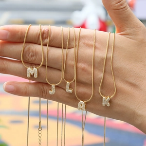 18k gold plated snake chain necklace set with five sparkling CZ letter pendants