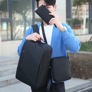Three-piece black business backpack set shown with matching crossbody and clutch bags