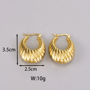 Detailed view of vintage gold crescent earrings showing 3.5cm height and 2.5cm width