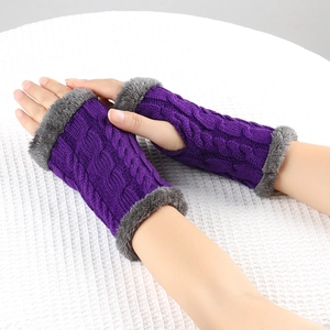 Close-up of purple knit fingerless gloves with grey faux fur cuffs on white background