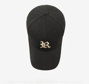 Top down view of black baseball cap with high density fabric and gold embroidery