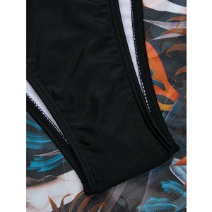 Close-up of black mesh bikini with high-quality double-stitch seams and soft white lining