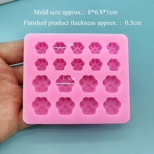 Pink silicone mold featuring two rows of 16 mini cat paw cavities for DIY resin crafts